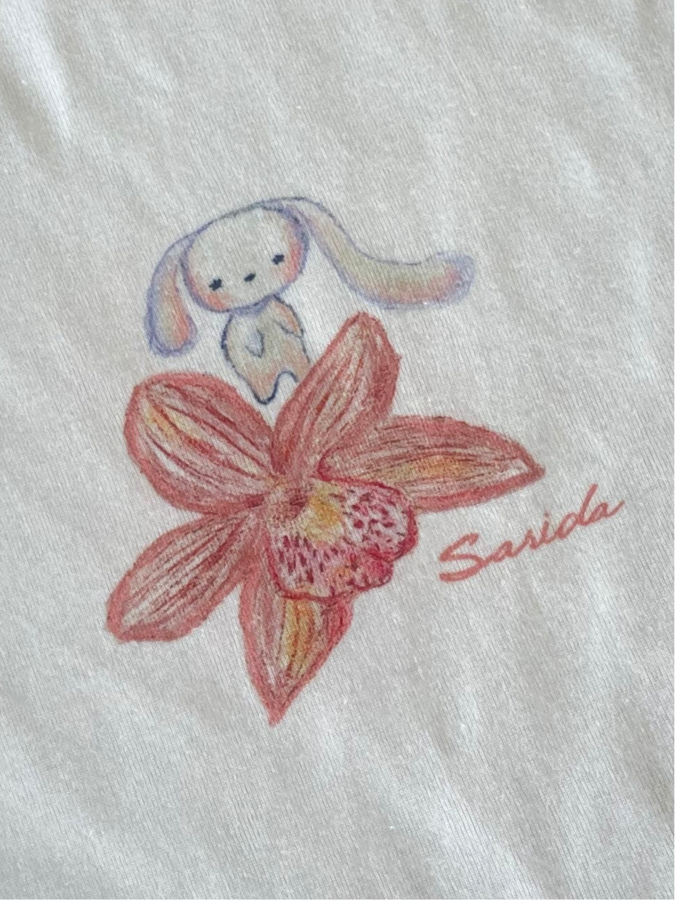 Limited Edition Sarida Orchid Baby Tee
